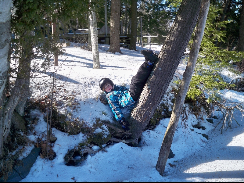 A cub taking a break from Broomball at winter camp